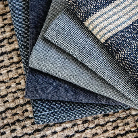 Blue and grey woven upholstery fabric swatches; reference