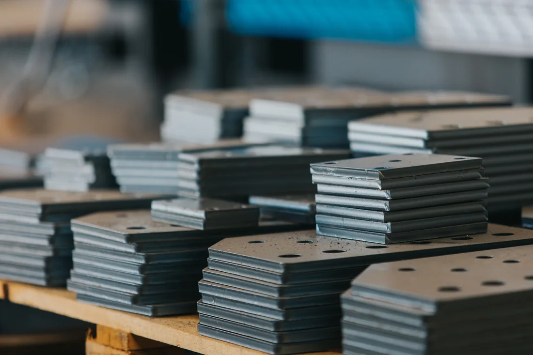Stacks of cut metal plates for sheet metal fabrication