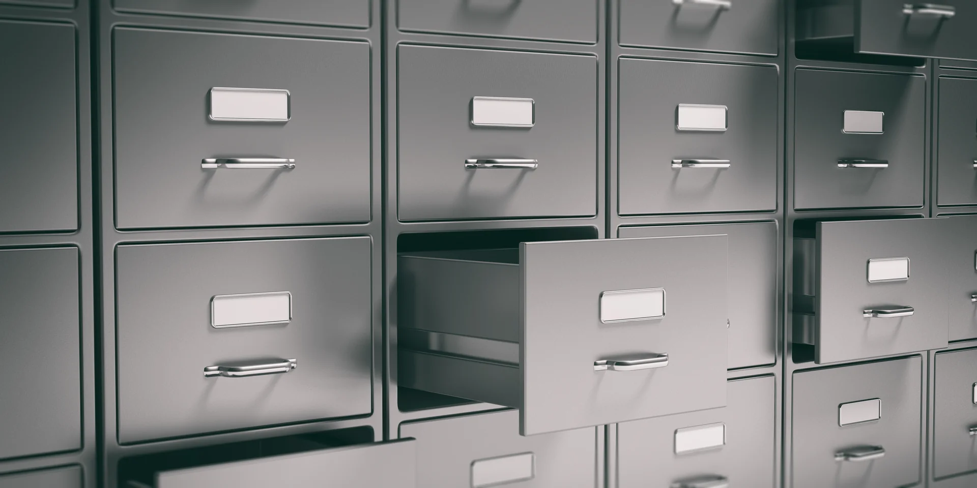 Painted metal filing cabinets with open drawers