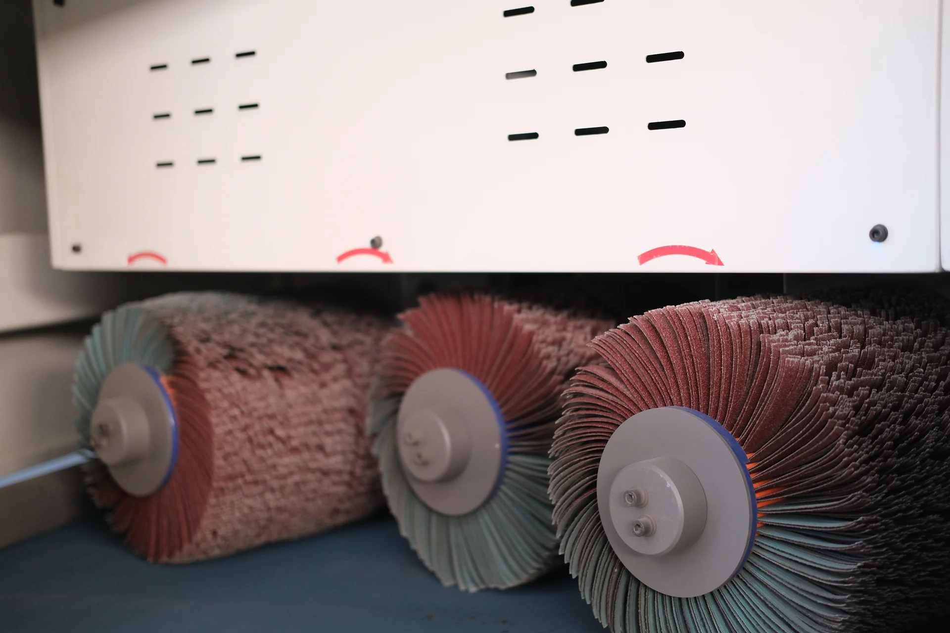 Three abrasive flap brush rollers; tooling reference