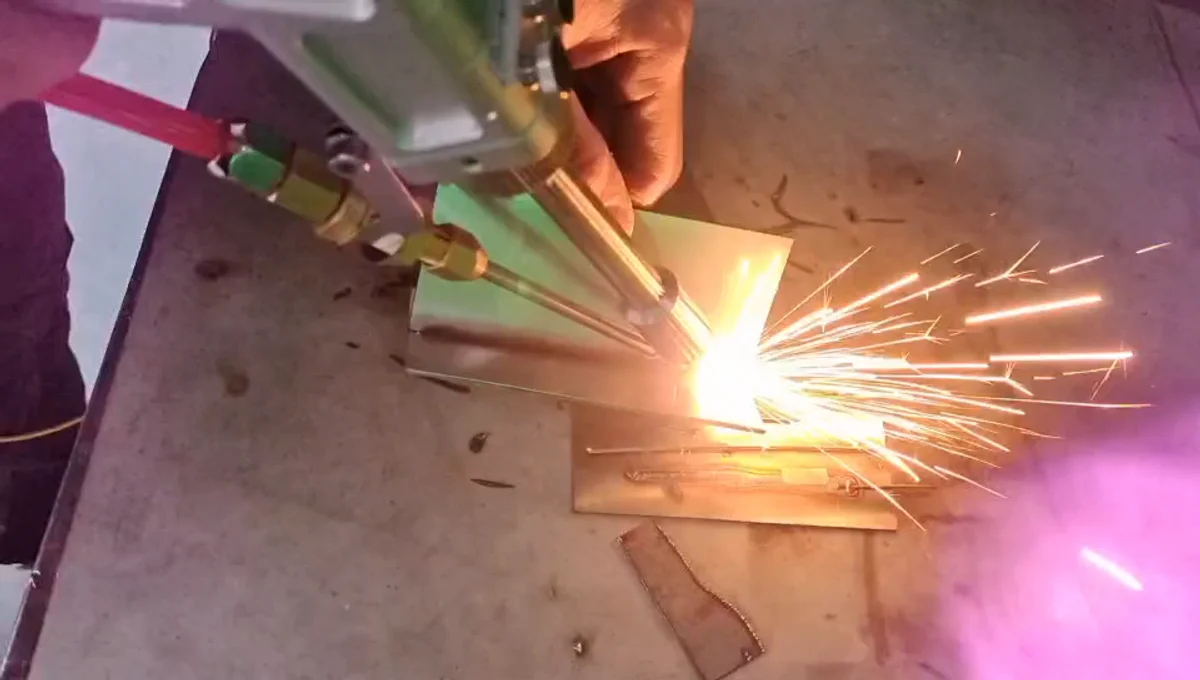 Handheld laser welding a sheet-metal sample