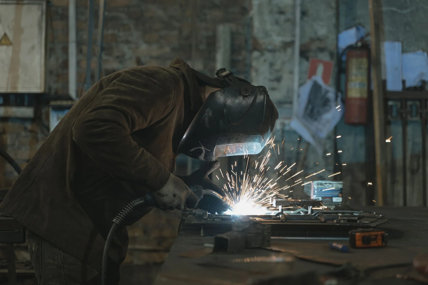 Arc welding at a work fixture; process reference
